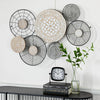 Black Metal Plate Wall Decor with Intricate Pattern