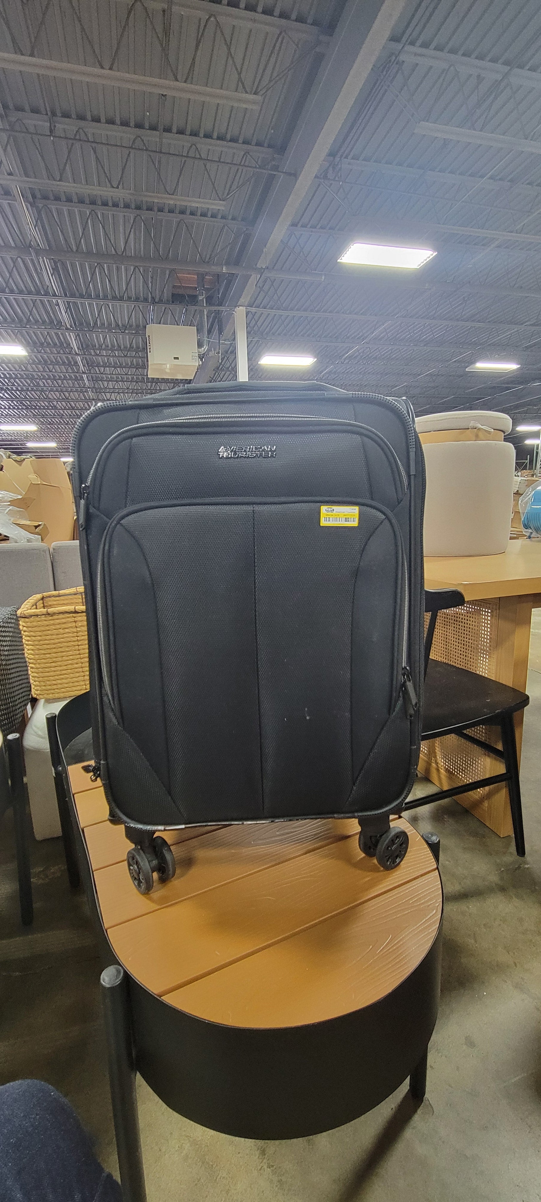 Phenom Softside Carry On Spinner Suitcase