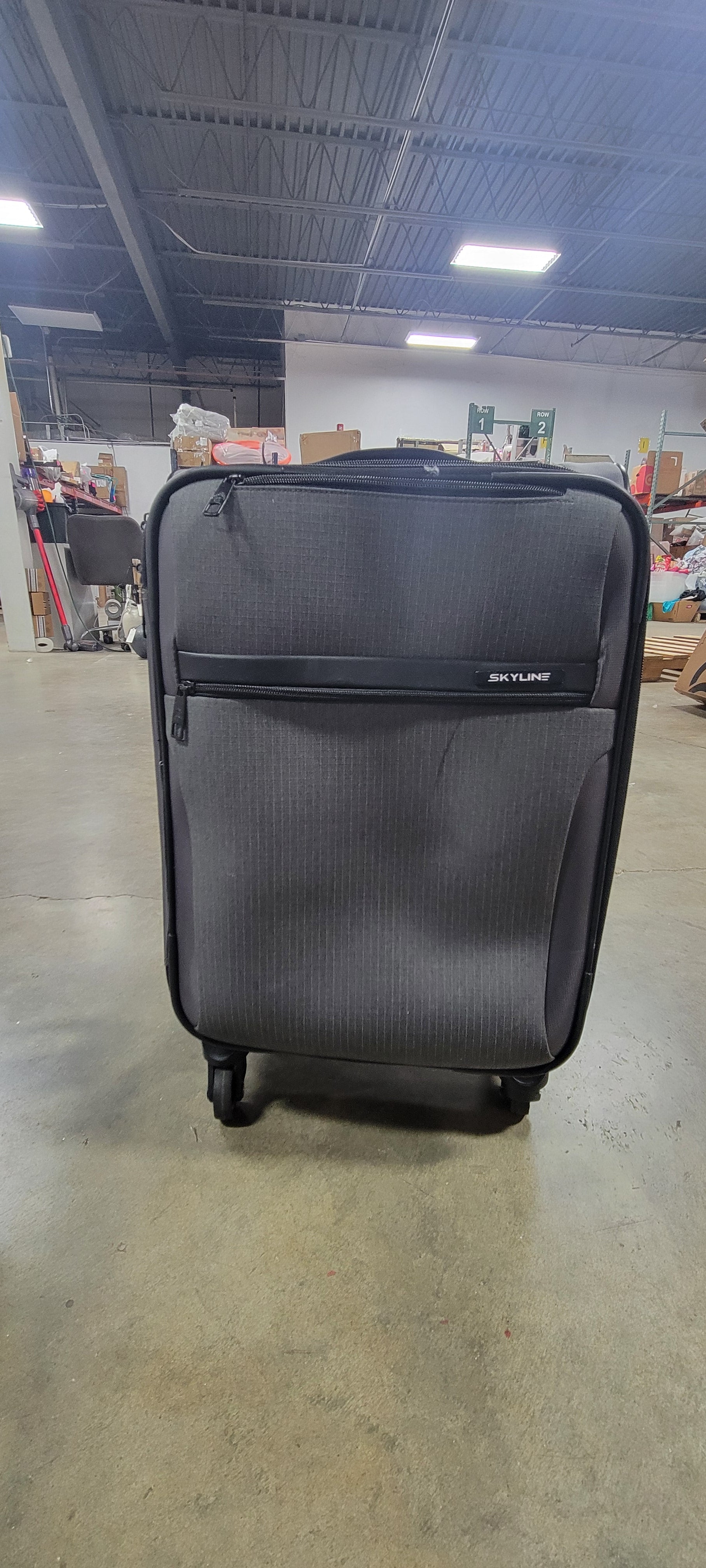 Softside Carry On Spinner Suitcase