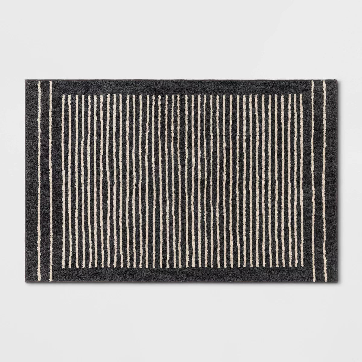 2'6"x4' Washable Knitted Stripe Accent Rug