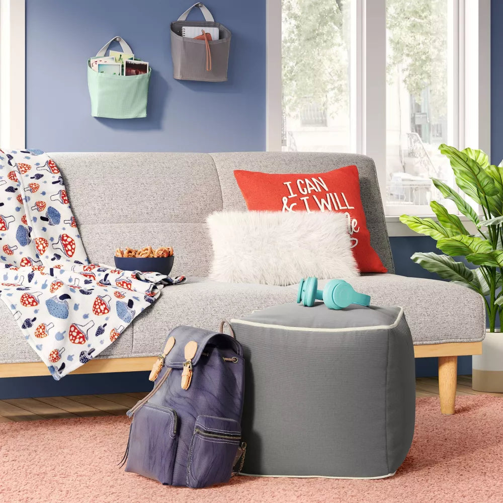 Color Block with Contrast Piping Pouf