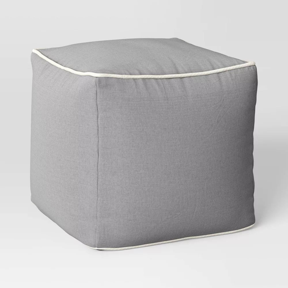 Color Block with Contrast Piping Pouf