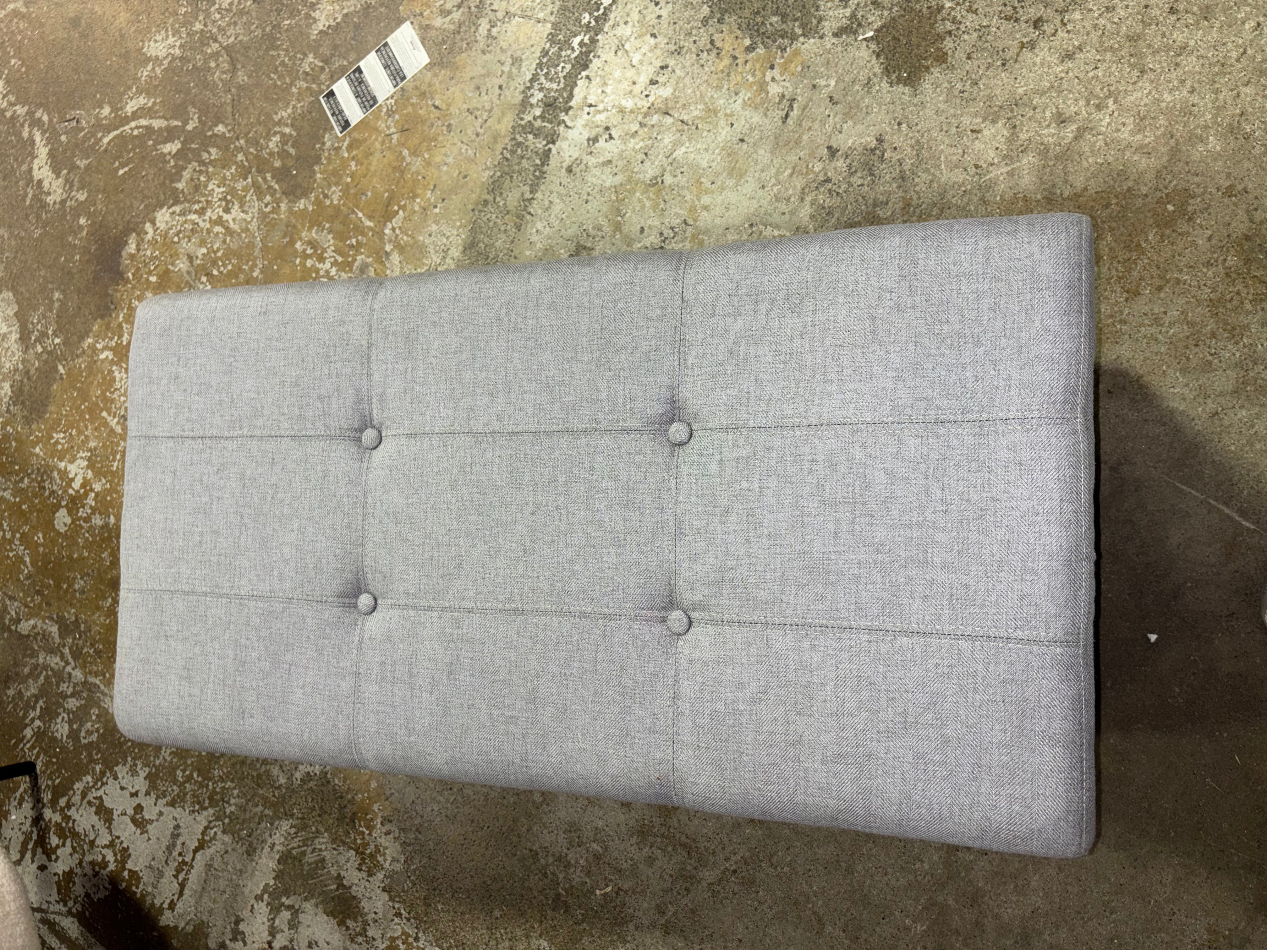 Tallu Upholstered Ottoman - Gray SHOWROOM ITEM