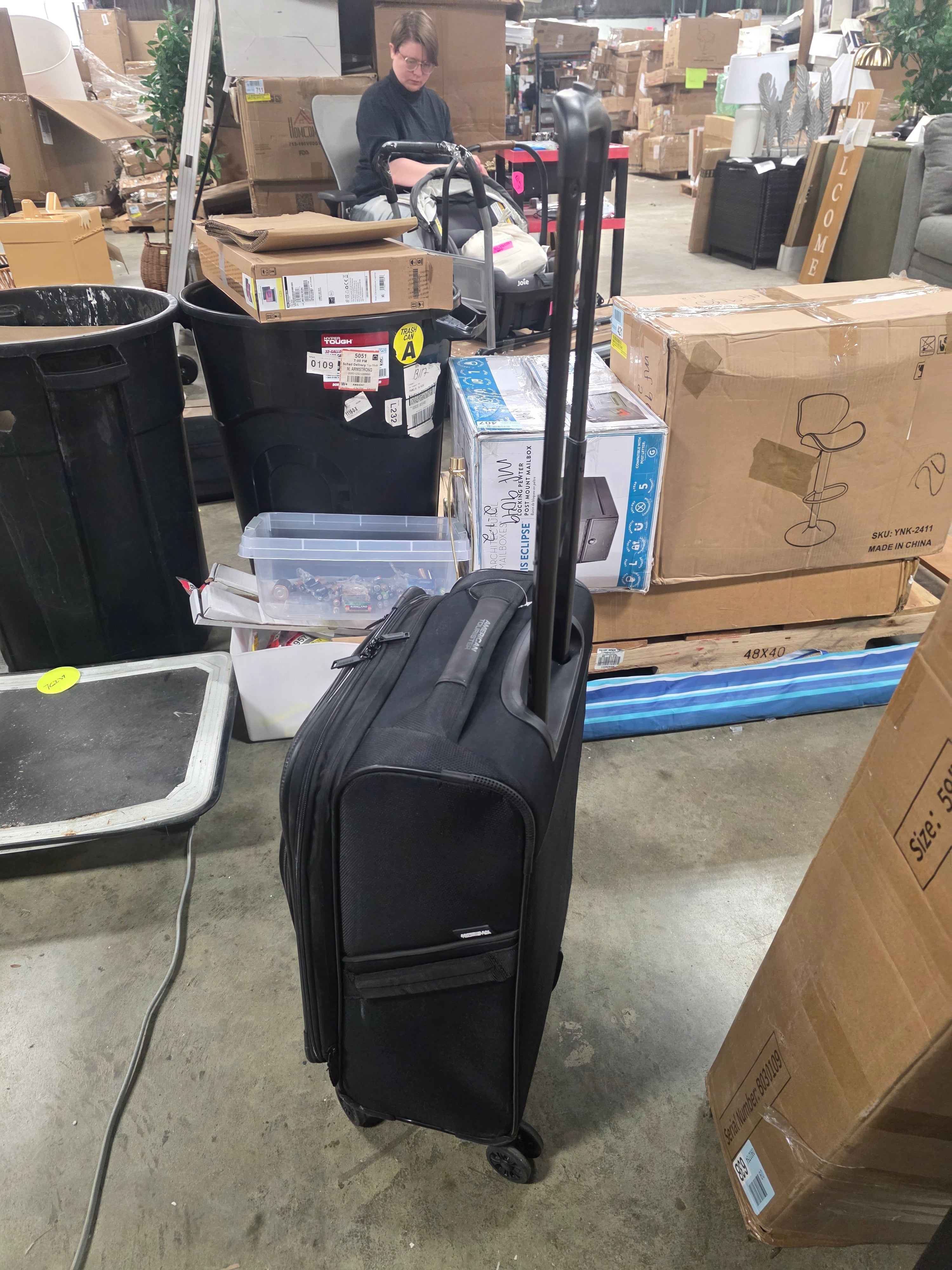 Phenom Softside Carry On Spinner Suitcase