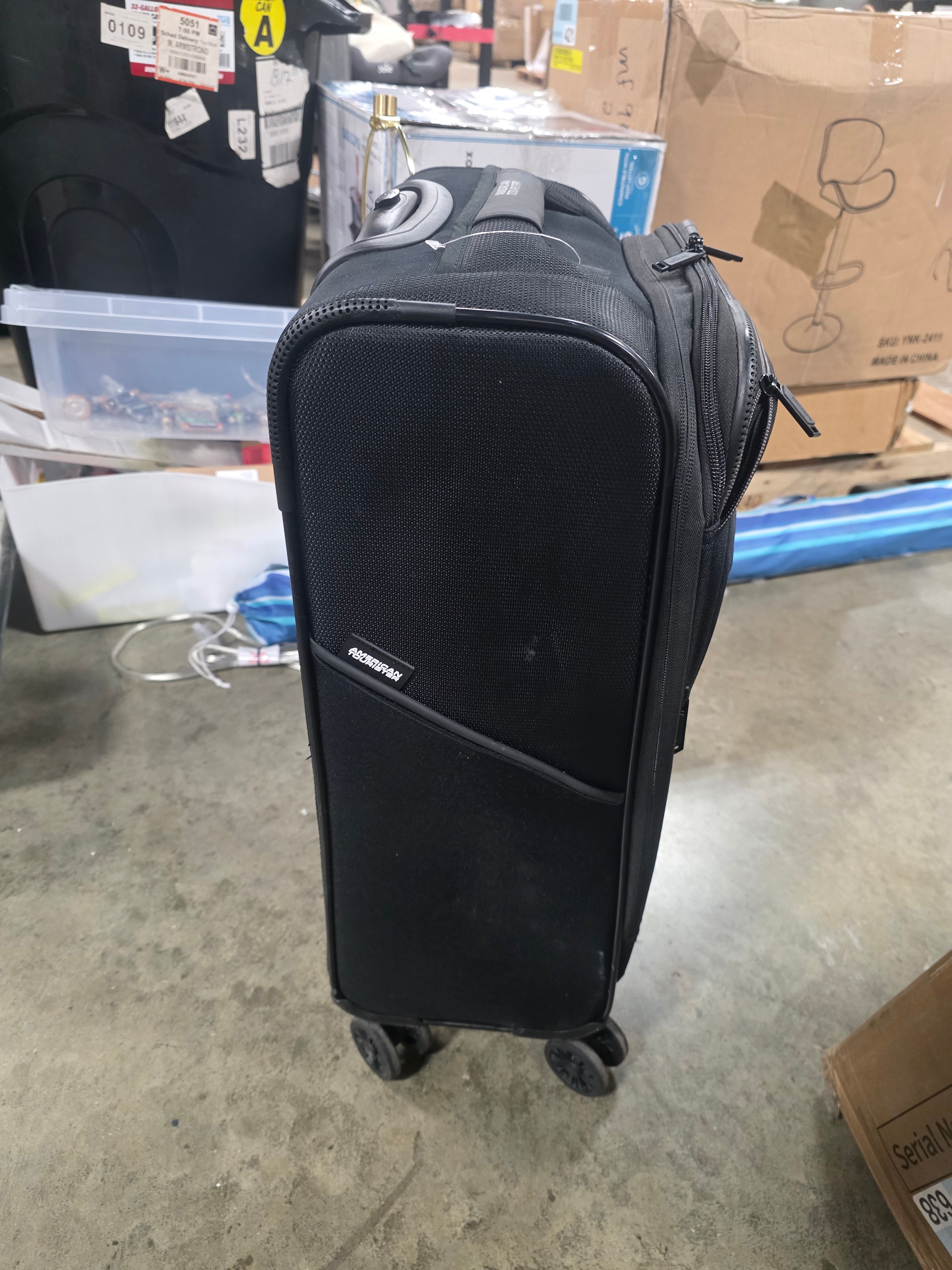Phenom Softside Carry On Spinner Suitcase
