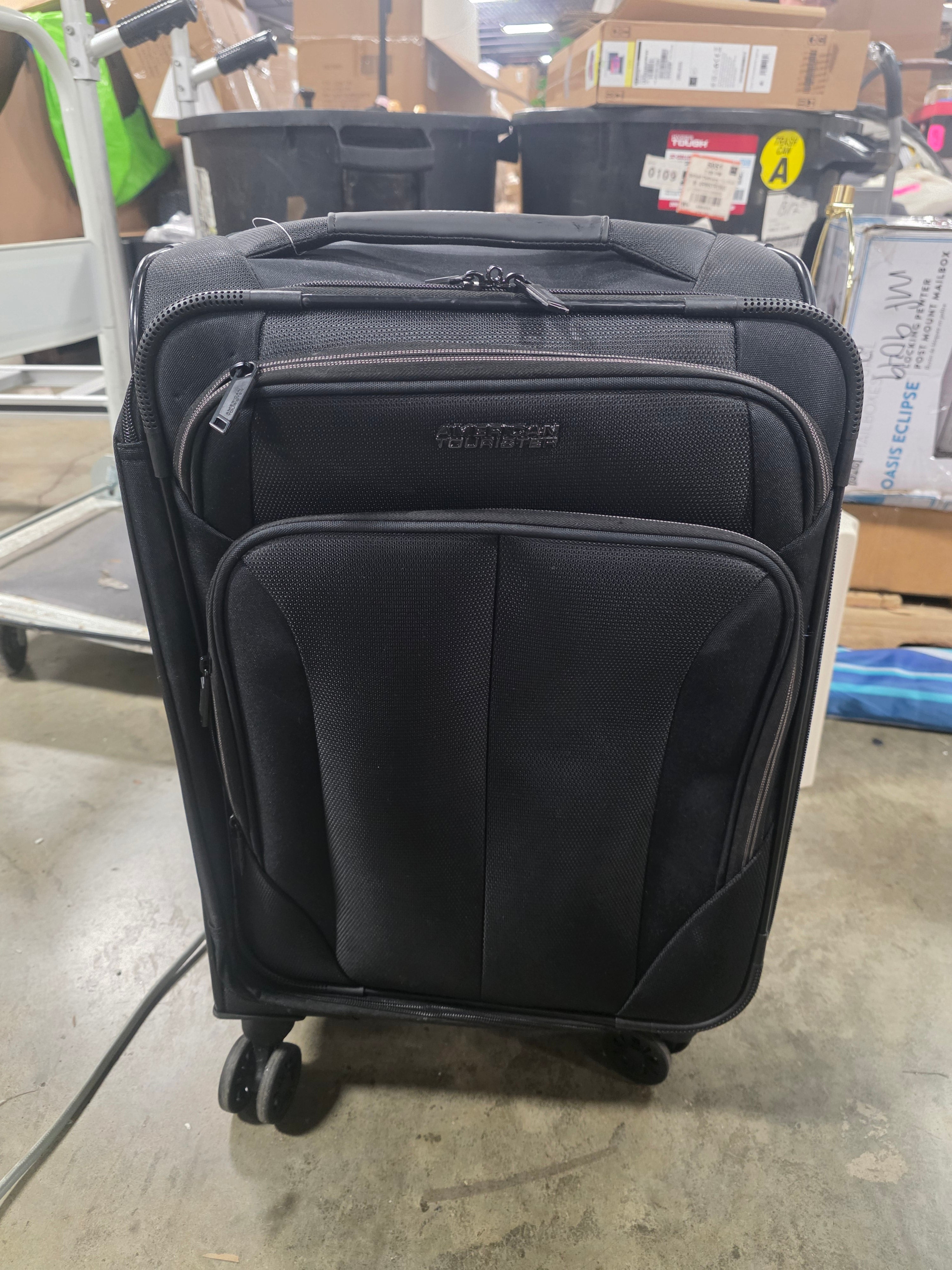 Phenom Softside Carry On Spinner Suitcase