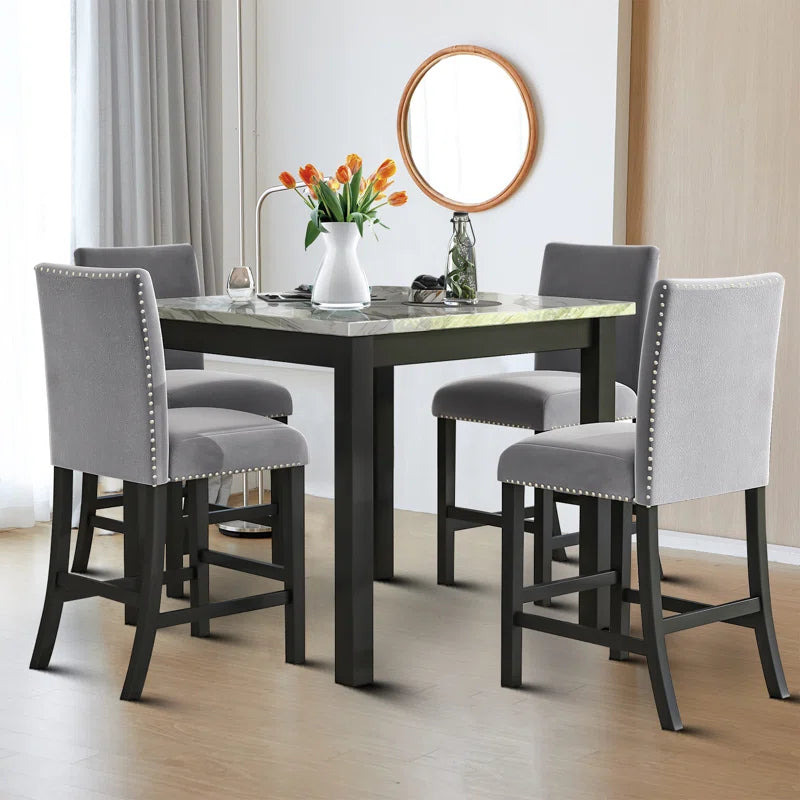 Quirke 4 - Person Counter Height Dining Set SHOWROOM ITEM ONLY