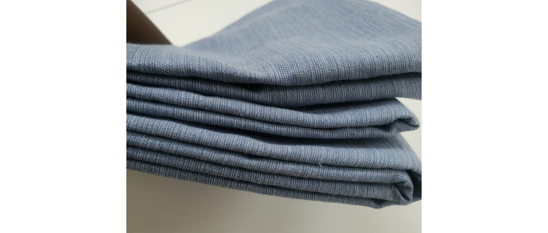Farrah Light Filtering Solid Blue Curtain Panel
