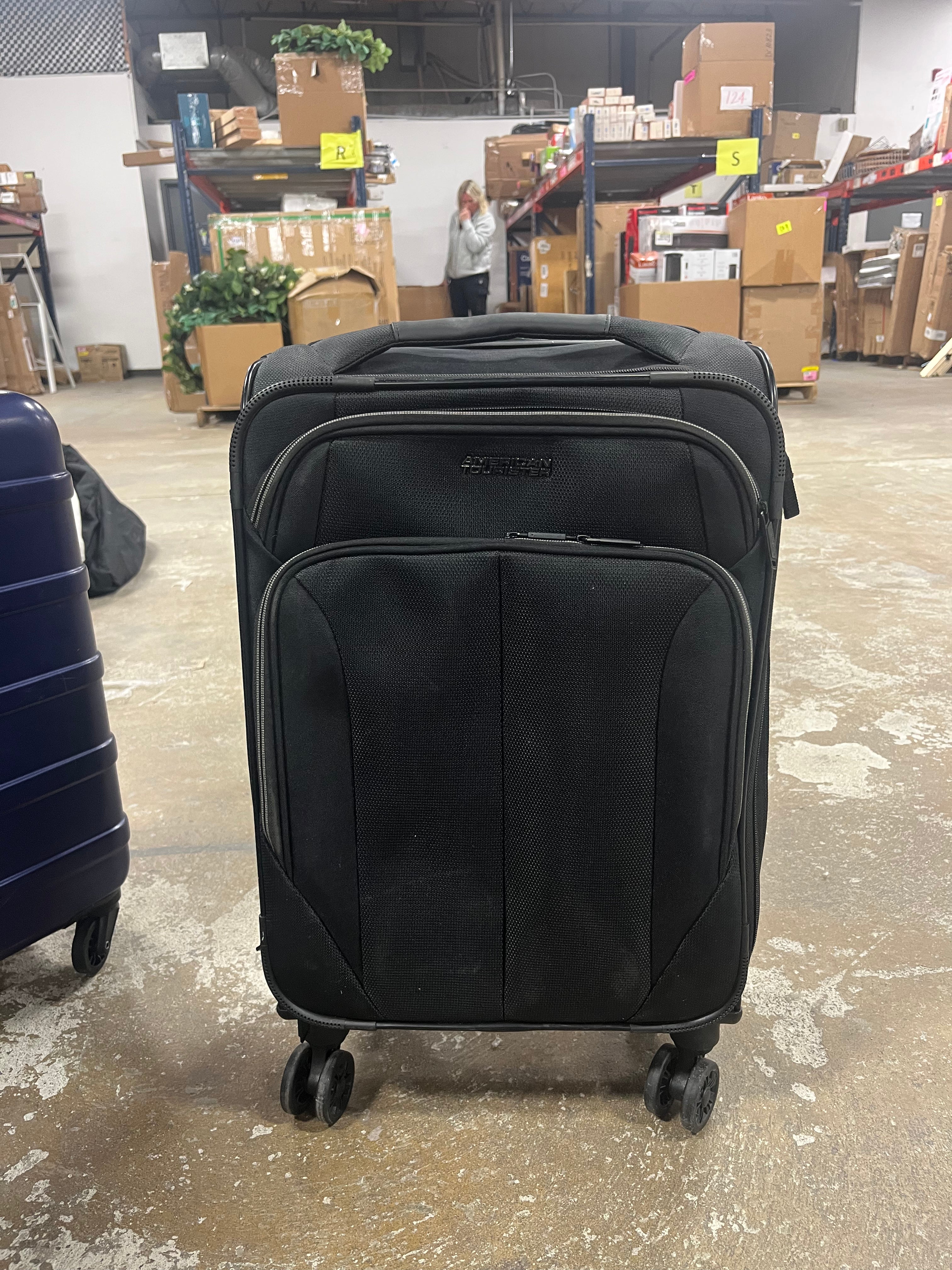 Phenom Softside Carry On Spinner Suitcase