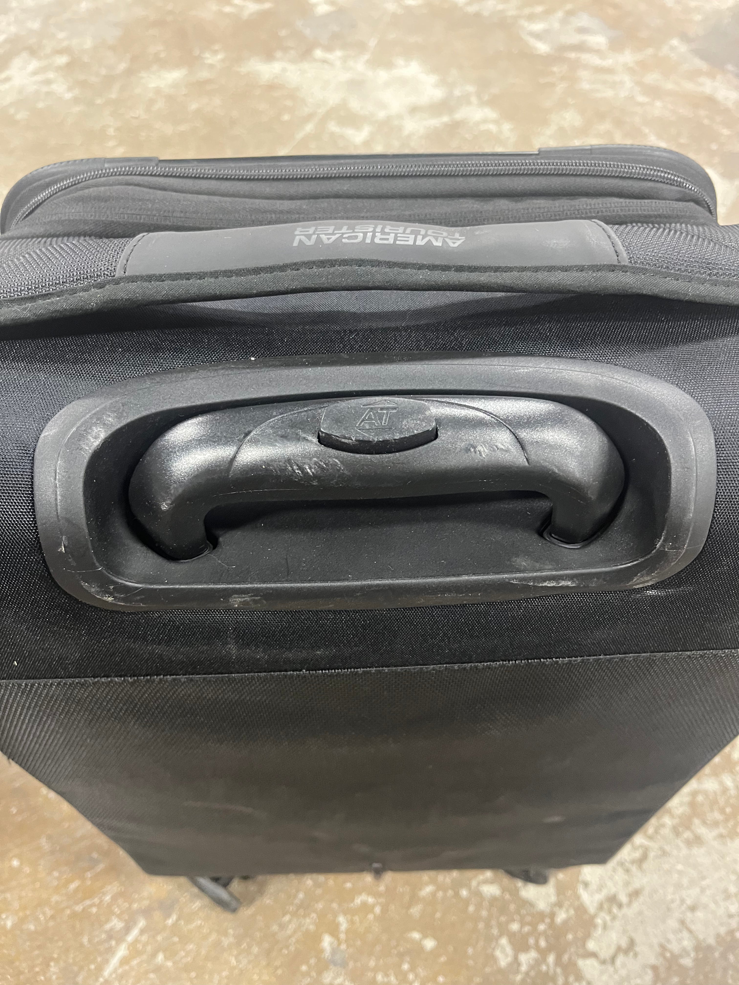 Phenom Softside Carry On Spinner Suitcase