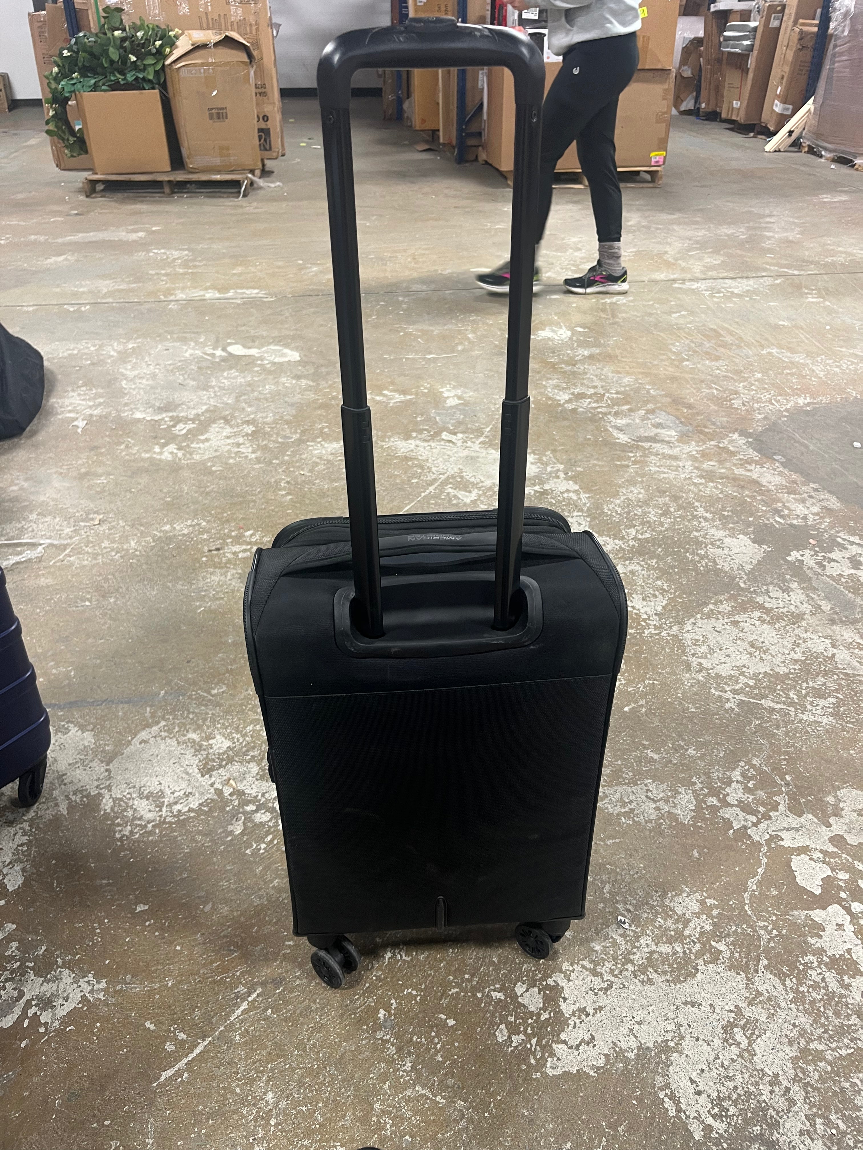 Phenom Softside Carry On Spinner Suitcase
