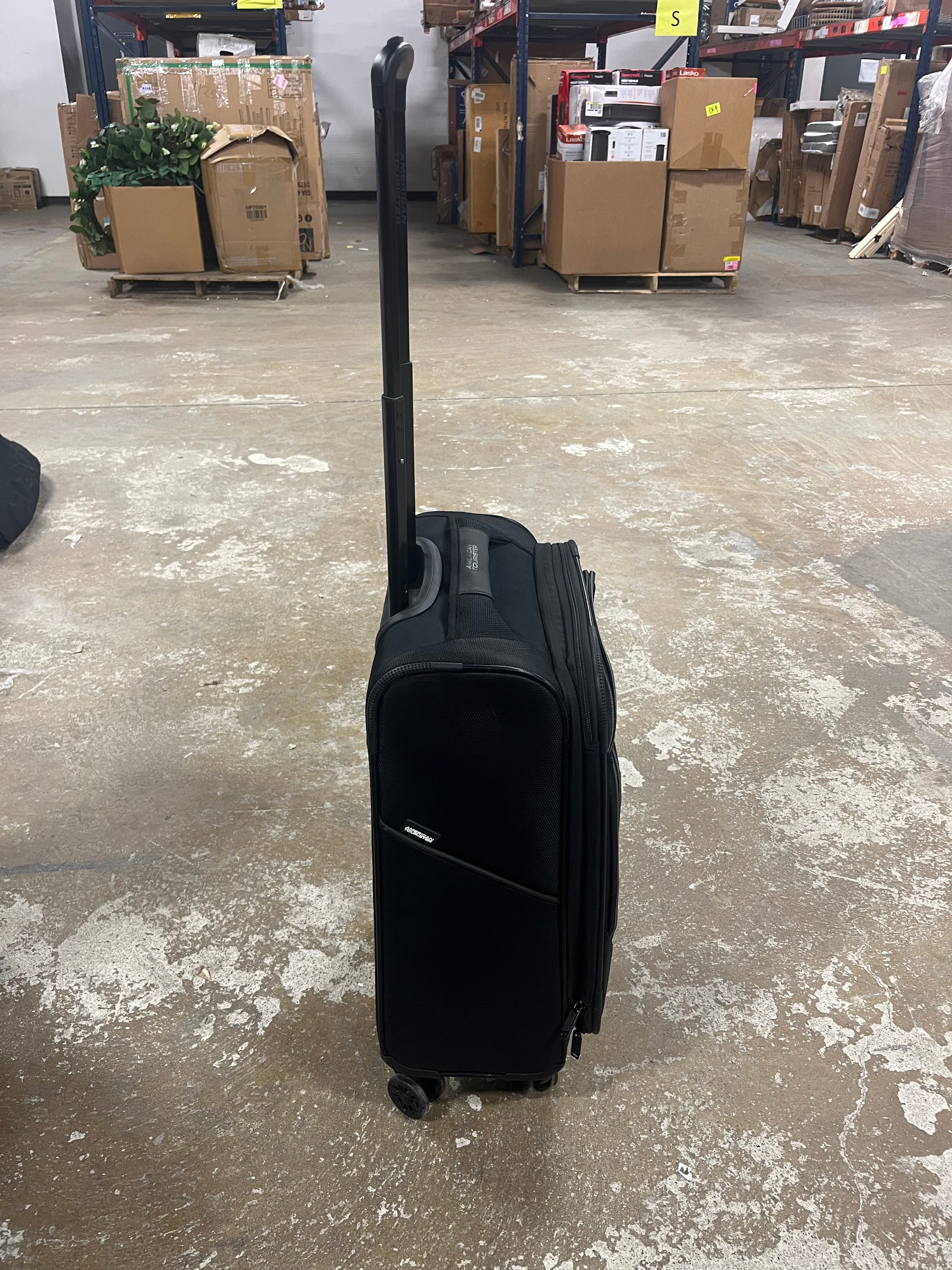 Phenom Softside Carry On Spinner Suitcase