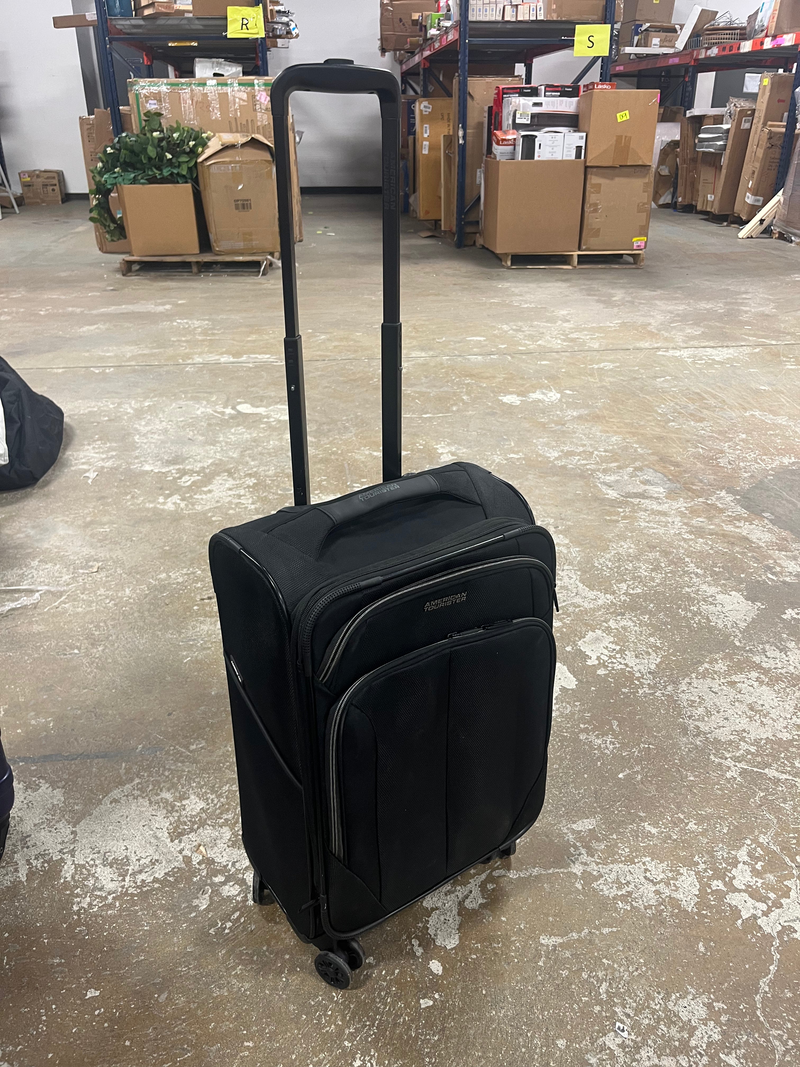 Phenom Softside Carry On Spinner Suitcase