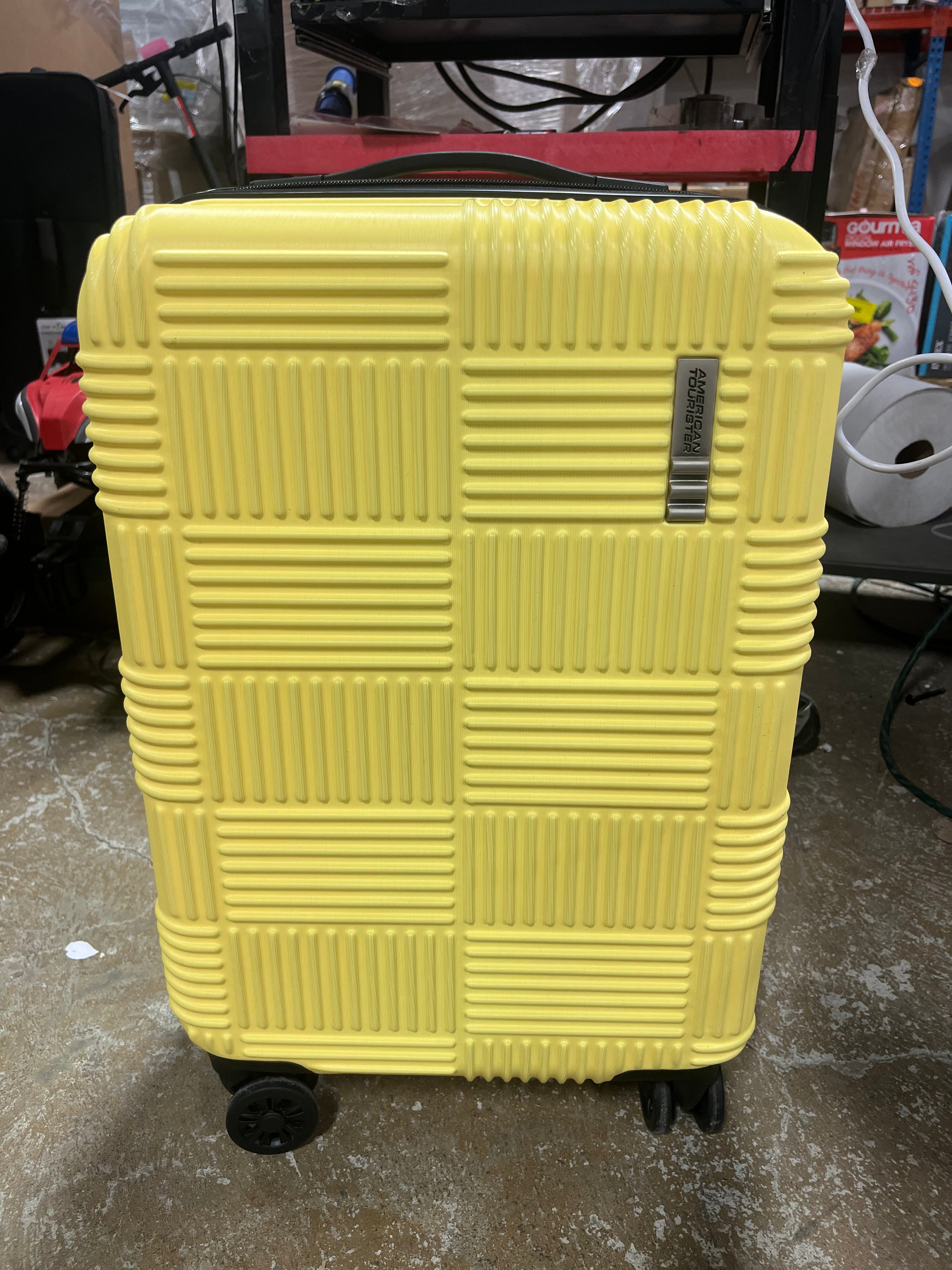 NXT Checkered Hardside Carry On Spinner Suitcase