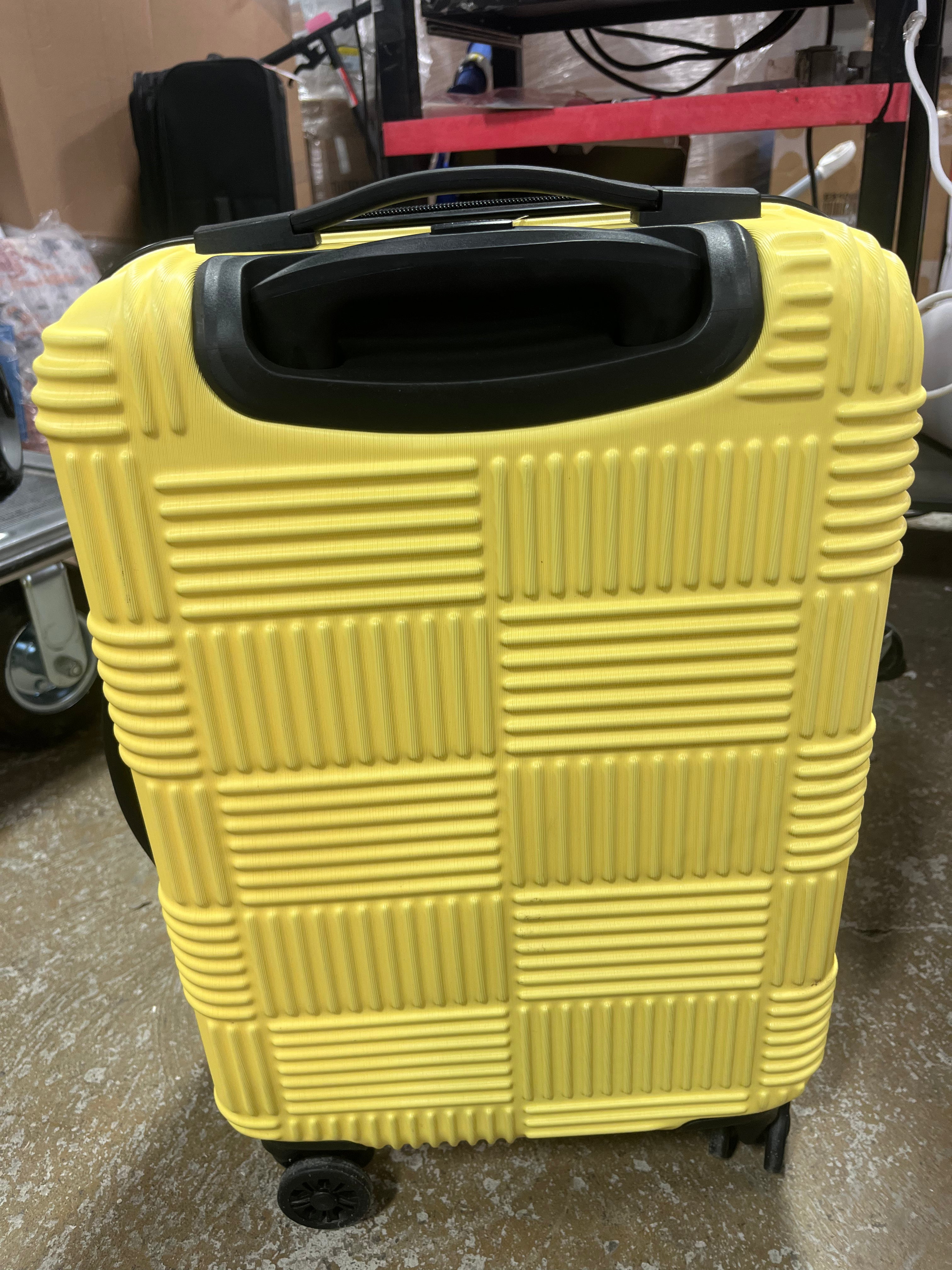NXT Checkered Hardside Carry On Spinner Suitcase