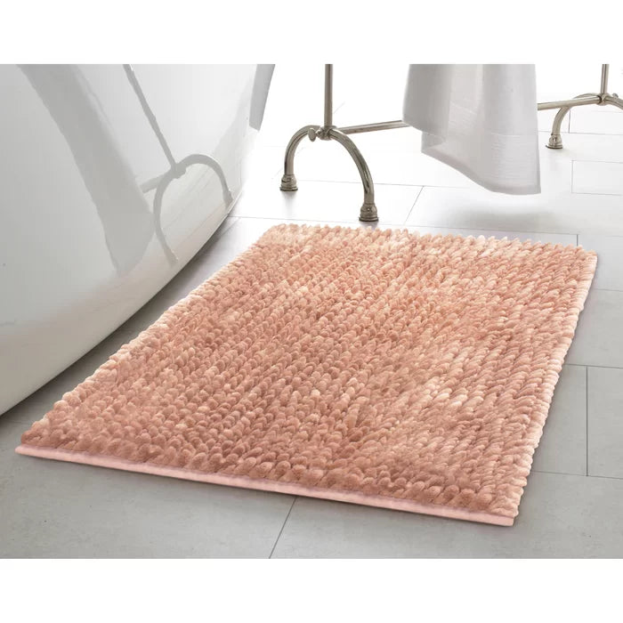20" L x 34" W x 1.25" H Blush Butter Chenille Bath Rug