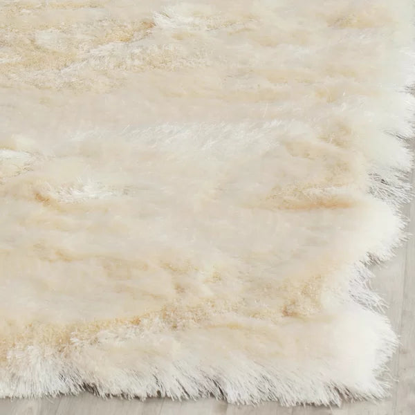 Chamira Abstract Handmade Tufted Area Rug in Creamy Ivory square 5'