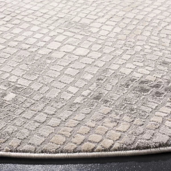 Edvin Abstract Area Rug in Taupe/Gray round 6'7"