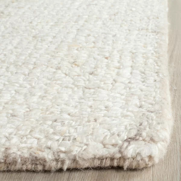 Gaten Handmade Tufted Area Rug in Ivory rectangle 6'x9'