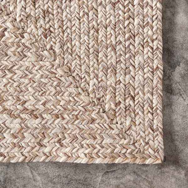 Owensby Handmade Braided Indoor / Outdoor Area Rug in Tan rectangle 7'6"x9'6"