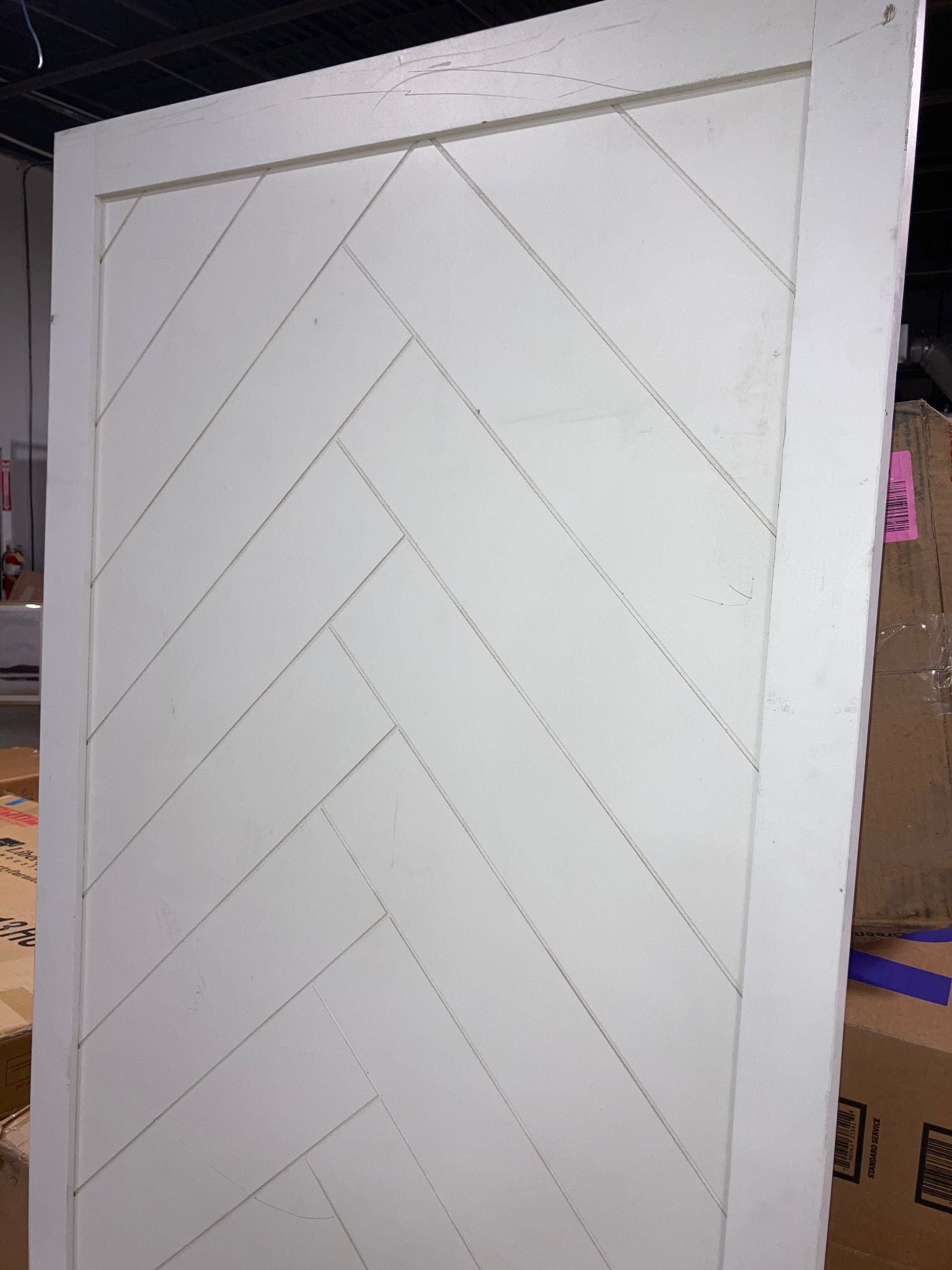 White Paneled Wood Finish Herringbone Barn Door with Installation Hardware Kit AS IS - OP015