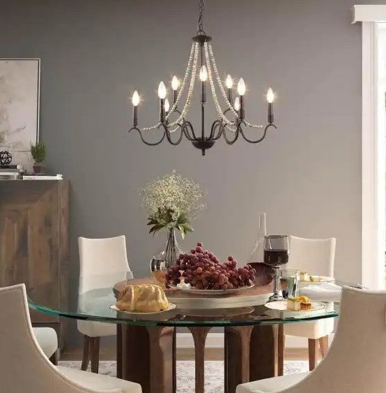 28 in. 9-Light Farmhouse Wood Beaded Dining Candle Chandelier with Rust Accents