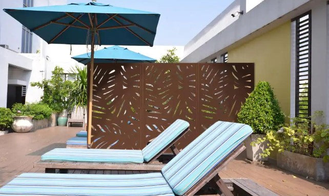 5 ft. x 3 ft. Espresso Brown Composite Framed Decorative Fence Panel Featured in the Palm Design