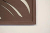 5 ft. x 3 ft. Espresso Brown Composite Framed Decorative Fence Panel Featured in the Palm Design