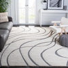 Stacie Abstract Area Rug in Cream/Gray rectangle 9'6