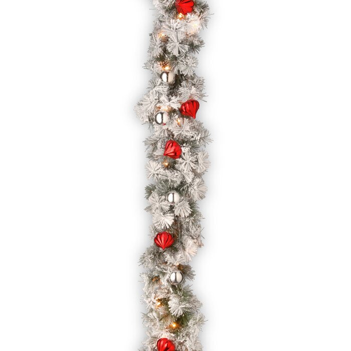 9' Snowy Bristle Pine Pre-Lit Garland with 70 Clear/White Lights (#K5536)