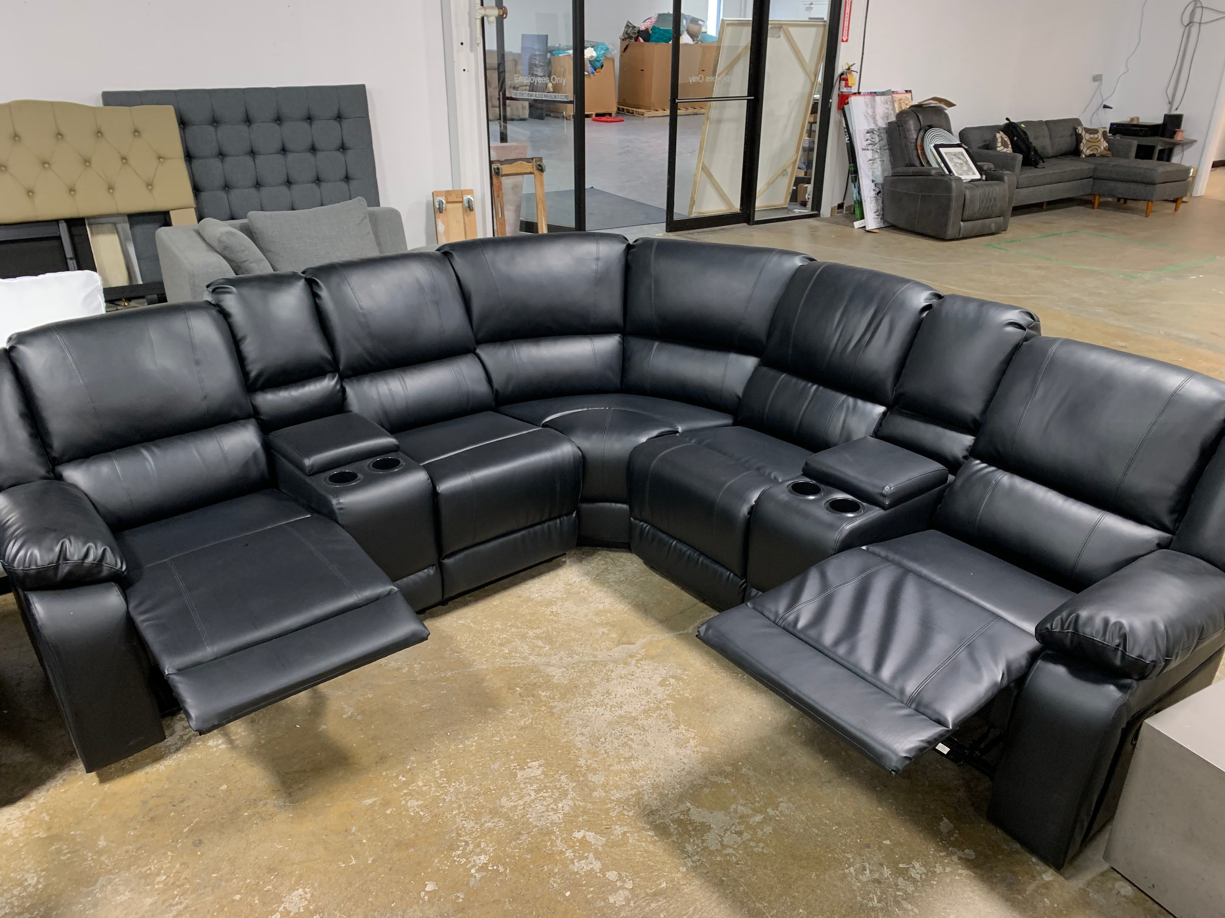 Black Leather Symmetrical Reclining Sectional