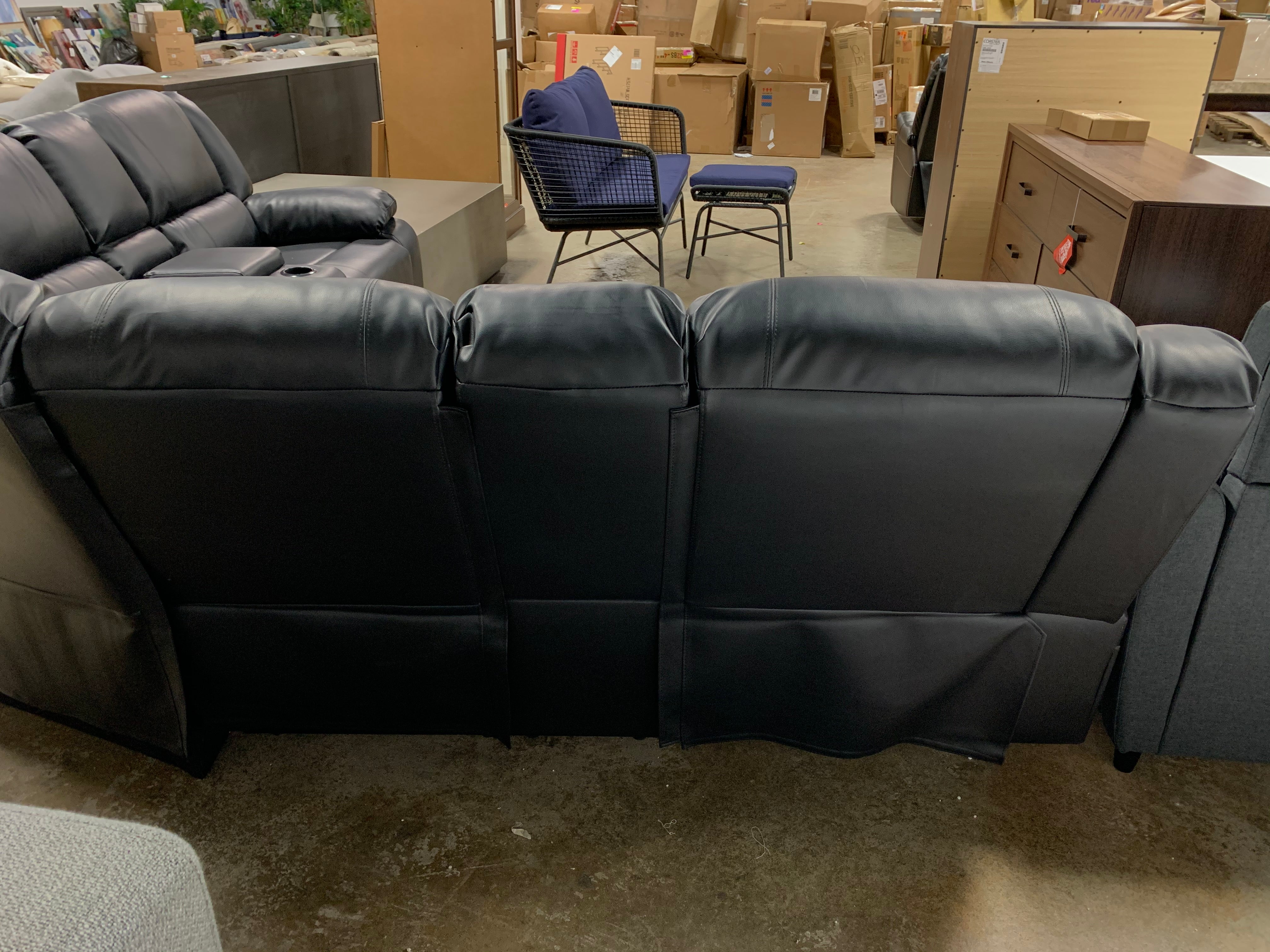Black Leather Symmetrical Reclining Sectional